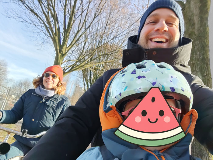 Michalis with his family on a bike ride.